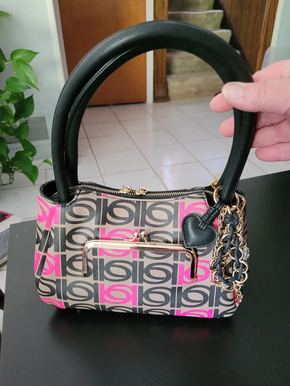 Bebe Women’s Patterned Top-Handle Bag in Black and Pink